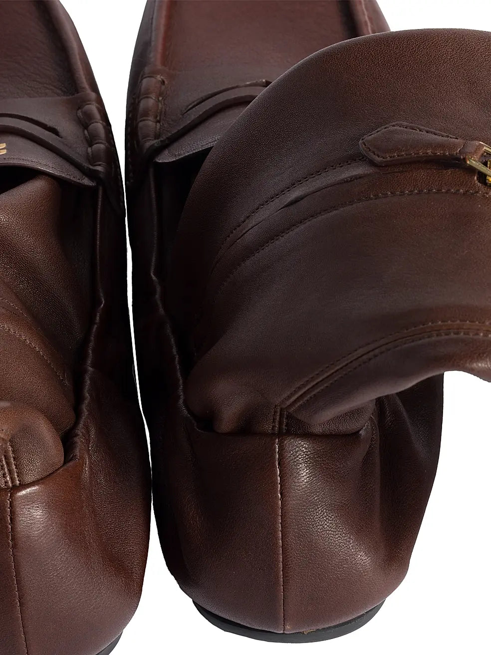 Men's brown Miu Miu leather loafer boots with sleek design and polished finish, stylish footwear for men.