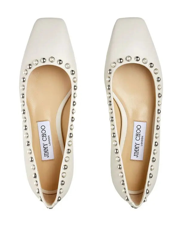 Pearl-embellished Jimmy Choo Mirele women's ballet flats in neutral tones, featuring elegant pearl decorations on soft leather shoes.