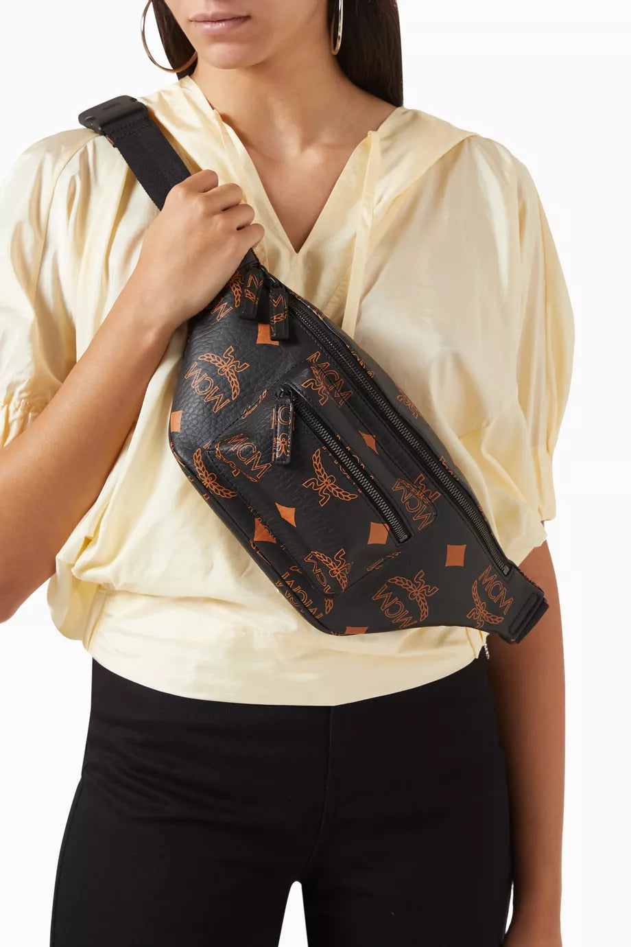 Black MCM Fursten belt bag for women, stylish leather accessory with a sleek design and adjustable strap.