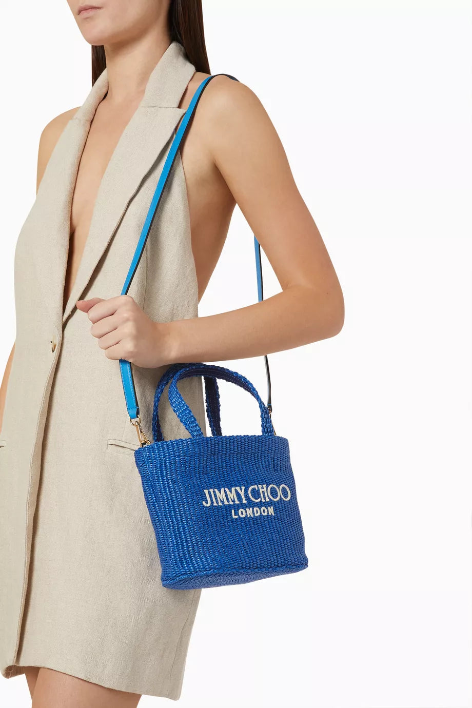 Blue Jimmy Choo Mini Beach Tote Bag in raffia with woven texture, perfect for stylish summer accessories.