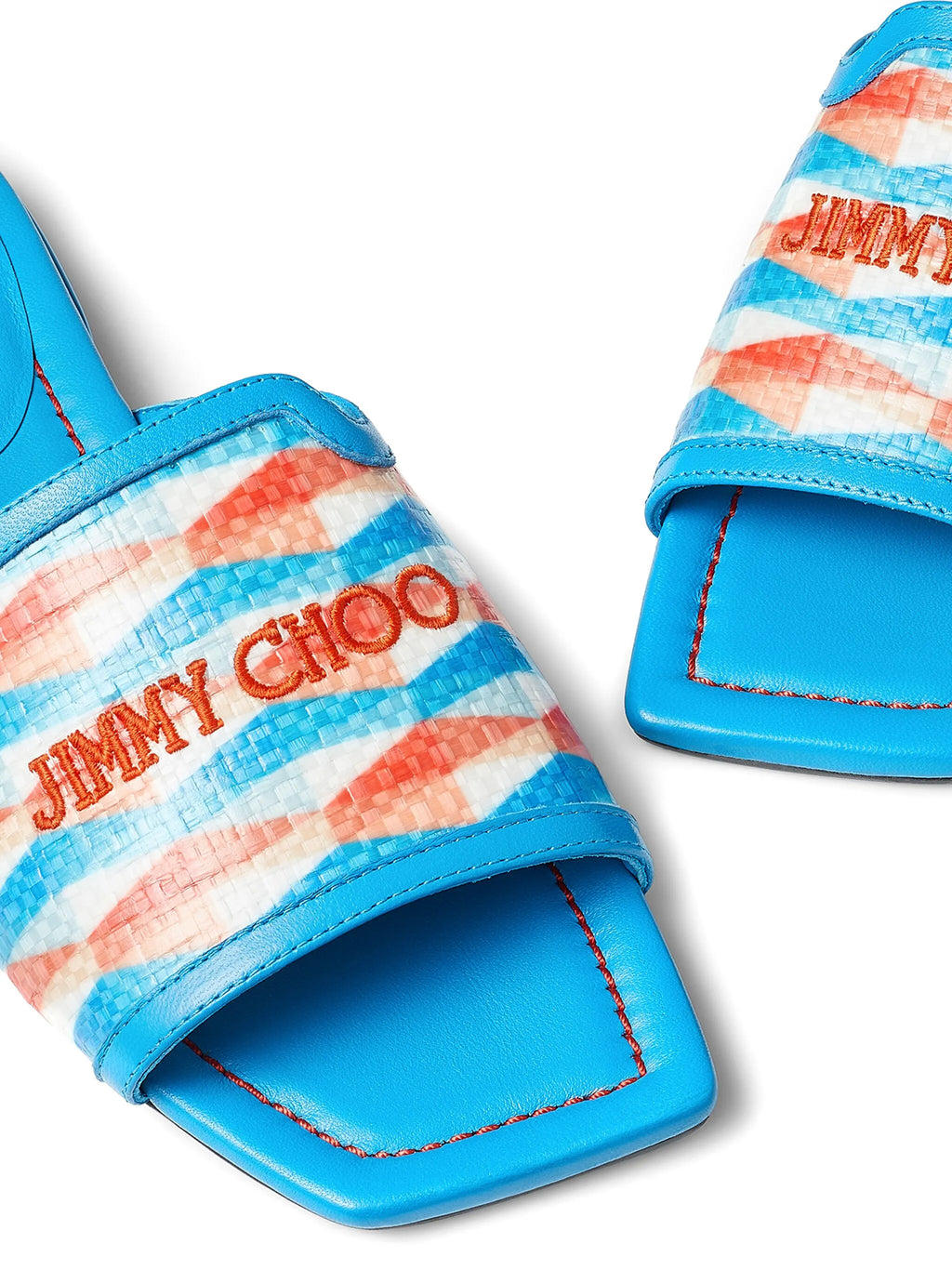 Jimmy Choo Nako woven and leather flat shoe featuring intricate woven pattern and sleek leather accents.