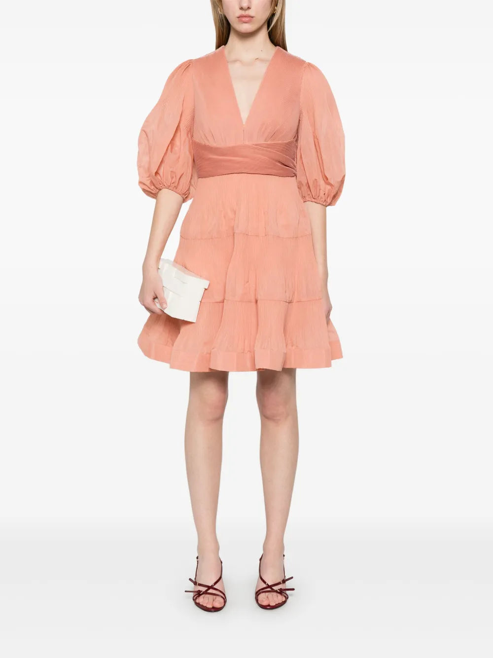 Zimmermann pleated mini dress for women, featuring a flowy design and elegant pleats, perfect for stylish summer wear.
