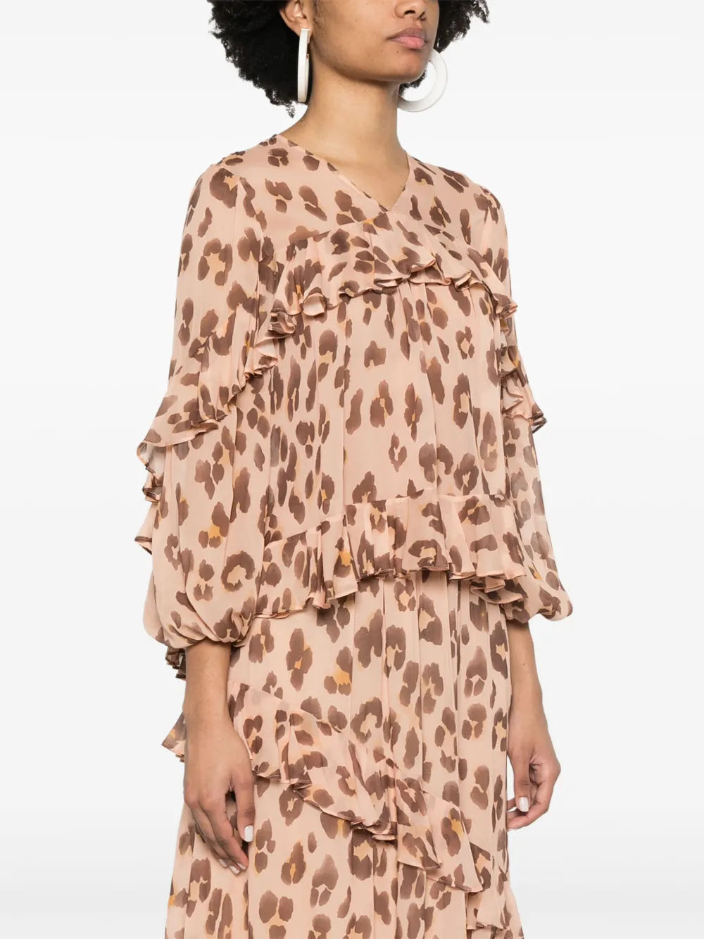 Zimmermann Illuminate V Neck Flutter Top for women, featuring lightweight fabric and flutter sleeves in a stylish design.