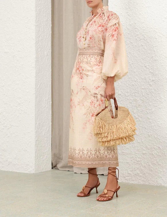 Zimmermann Illuminate Blouse for women featuring coral floral print, lightweight fabric, and elegant design.