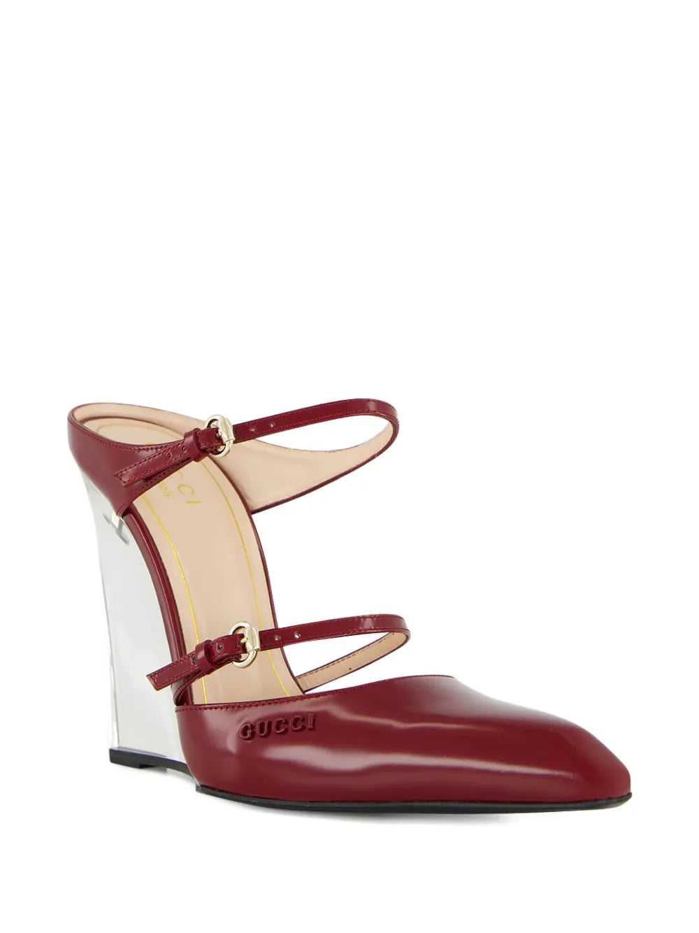 Gucci Christy leather wedge mules for women, stylish footwear with a sleek design and comfortable wedge heel.