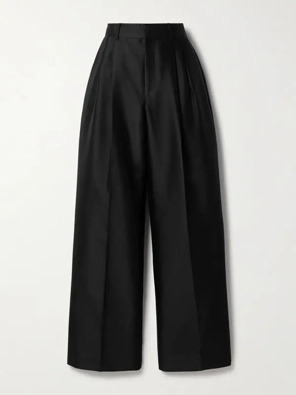 Black Zimmermann pleated silk and wool-blend wide-leg pants for women, showcasing their tailored, flowing design and high-quality fabric.