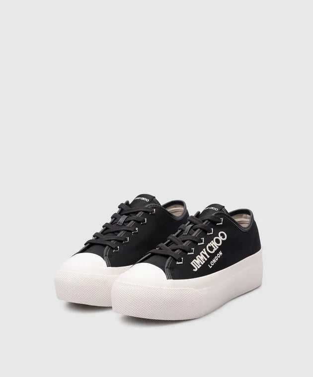 Unisex Jimmy Choo Palma Maxi black sneakers with sleek design and white sole, showcased from a side view.