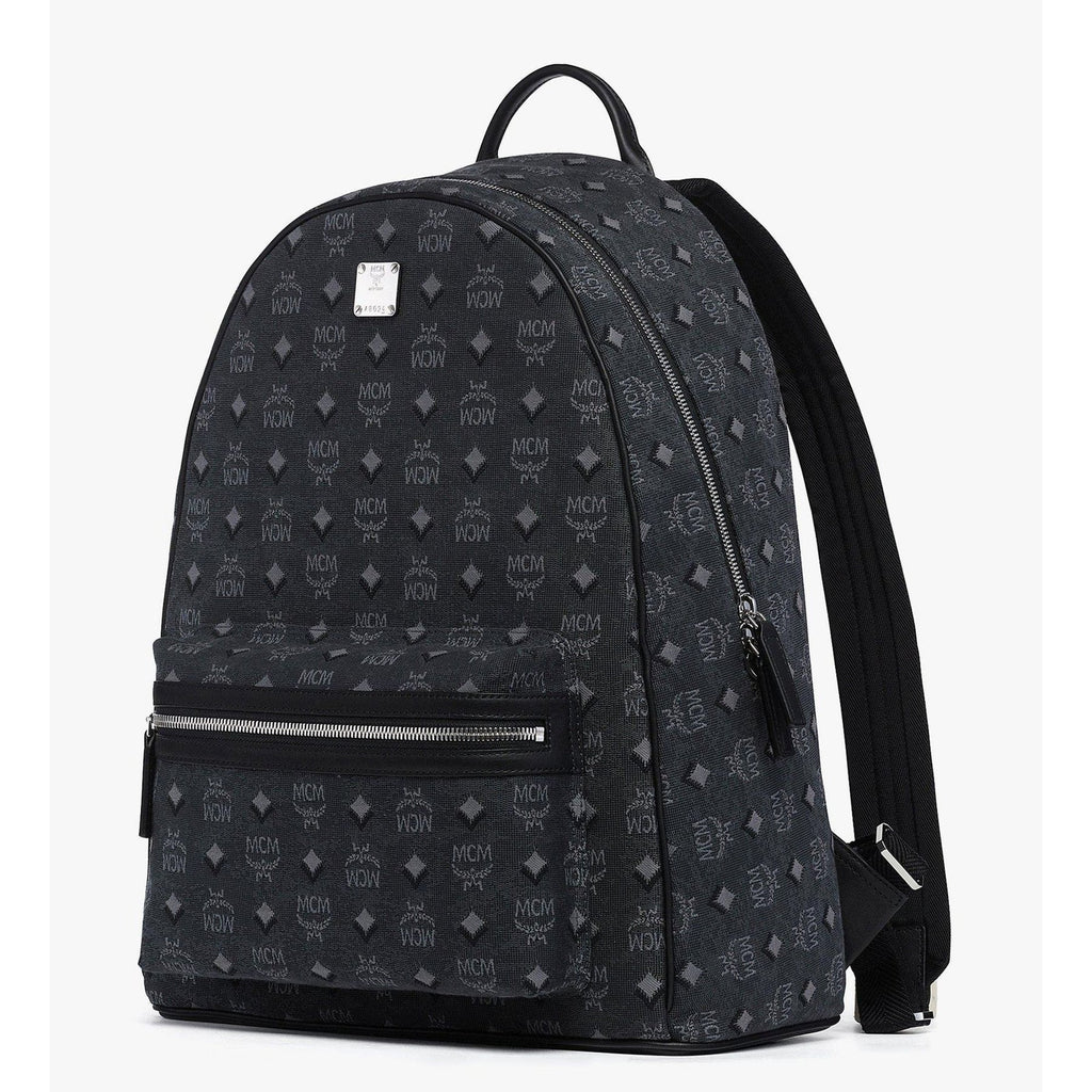 MCM Stark Backpack in denim Visetos XL, women's designer bag with large size, featuring the signature pattern and stylish denim material.