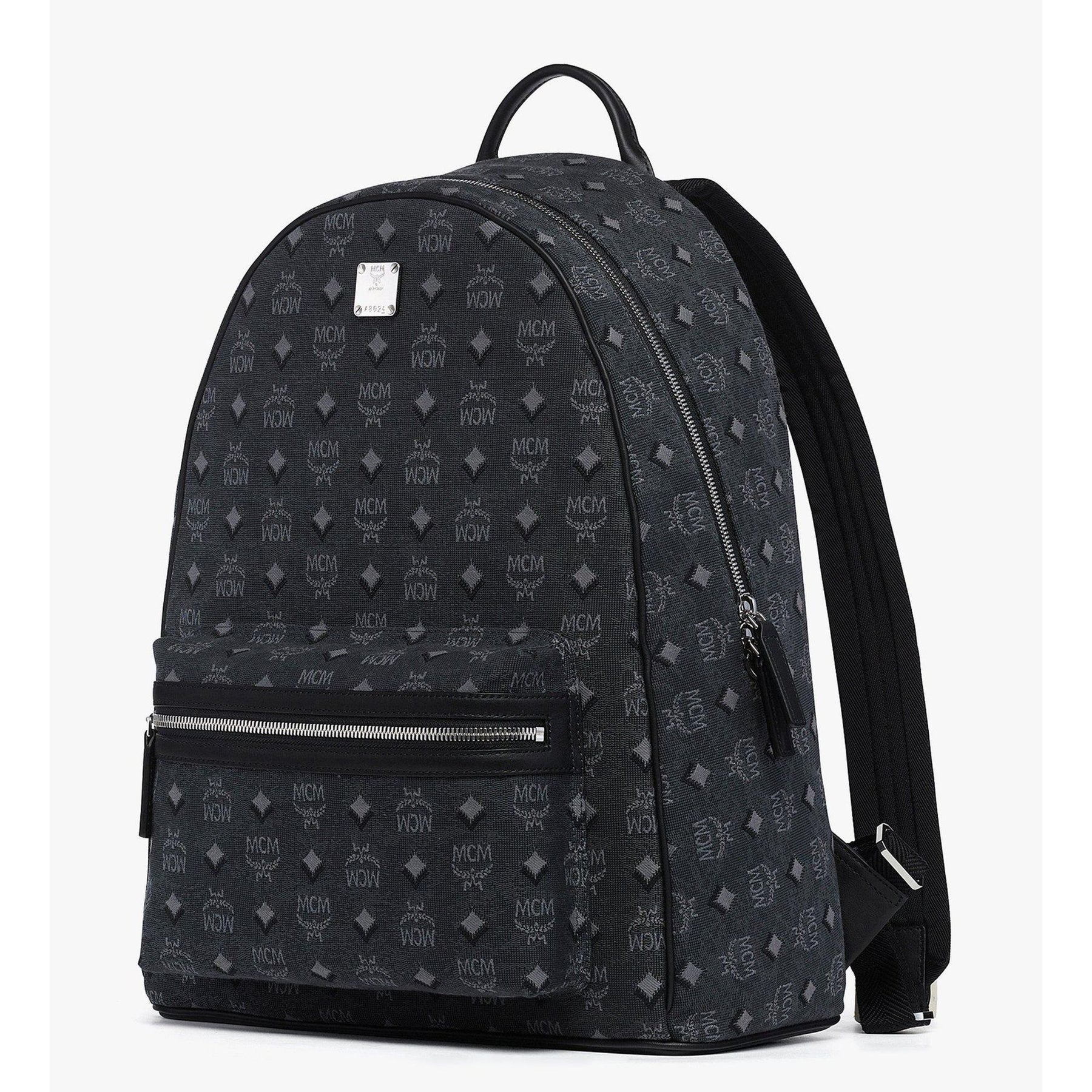 MCM Stark Backpack in denim Visetos XL, women's designer bag with large size, featuring the signature pattern and stylish denim material.