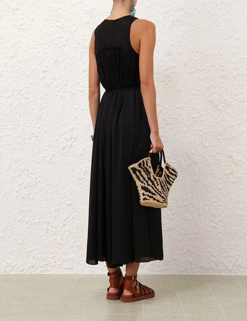 Black Zimmermann Balance Swing Maxi Dress for women, featuring flowing fabric and elegant design.