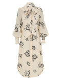 Zimmermann printed ruffle midi dress for women, featuring floral patterns and feminine ruffle details, perfect for stylish occasions.