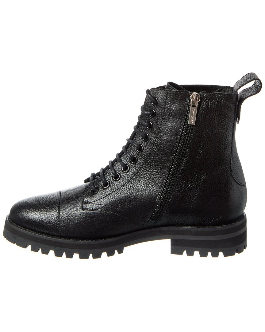 Black Jimmy Choo Halden combat boots for women made of pebbled leather, featuring rugged soles and stylish ankle height.