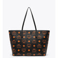 MCM Aren tote bag for women with signature monogram print, featuring leather handles and spacious interior.
