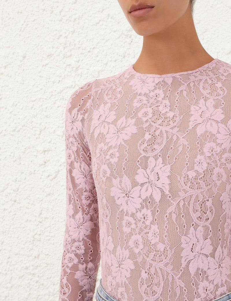 Zimmermann lace women's bodysuit featuring delicate lace fabric and fitted design, perfect for stylish layered outfits.