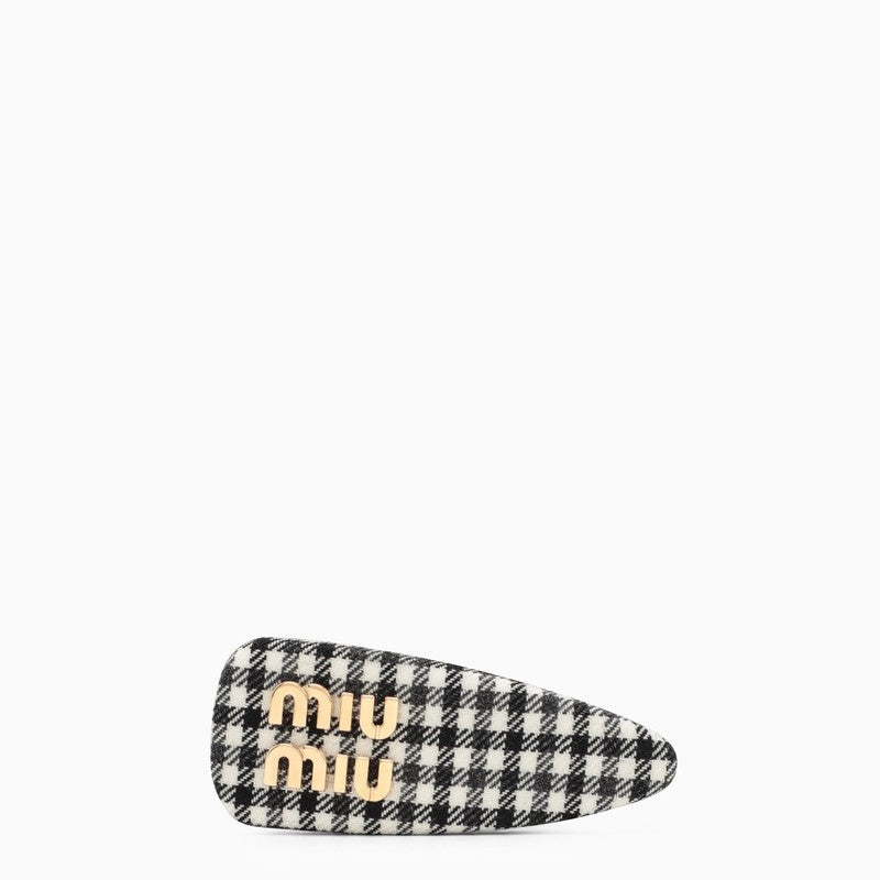 White and black Miu Miu houndstooth hair clip for women, stylish accessories with a classic pattern and elegant design.