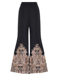 Zimmermann Natura Flare Pant for women, featuring wide-leg design and lightweight fabric, shown in a stylish fashion image.