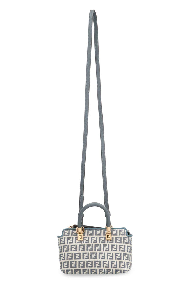 Fendi Mini Bauletto By The Way women’s bag in beige leather with top handles and gold hardware, stylish and compact design.