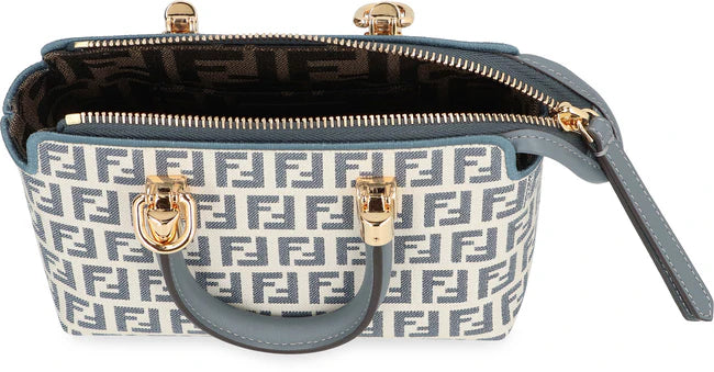 Fendi Mini Bauletto By The Way women’s bag in beige with black accents, featuring a top handle and adjustable shoulder strap.