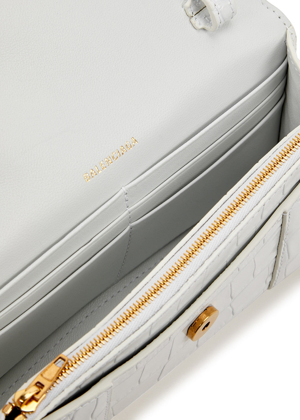White Balenciaga Women's Hourglass Wallet On Chain bag with silver chain and minimalist design, shown from front view.