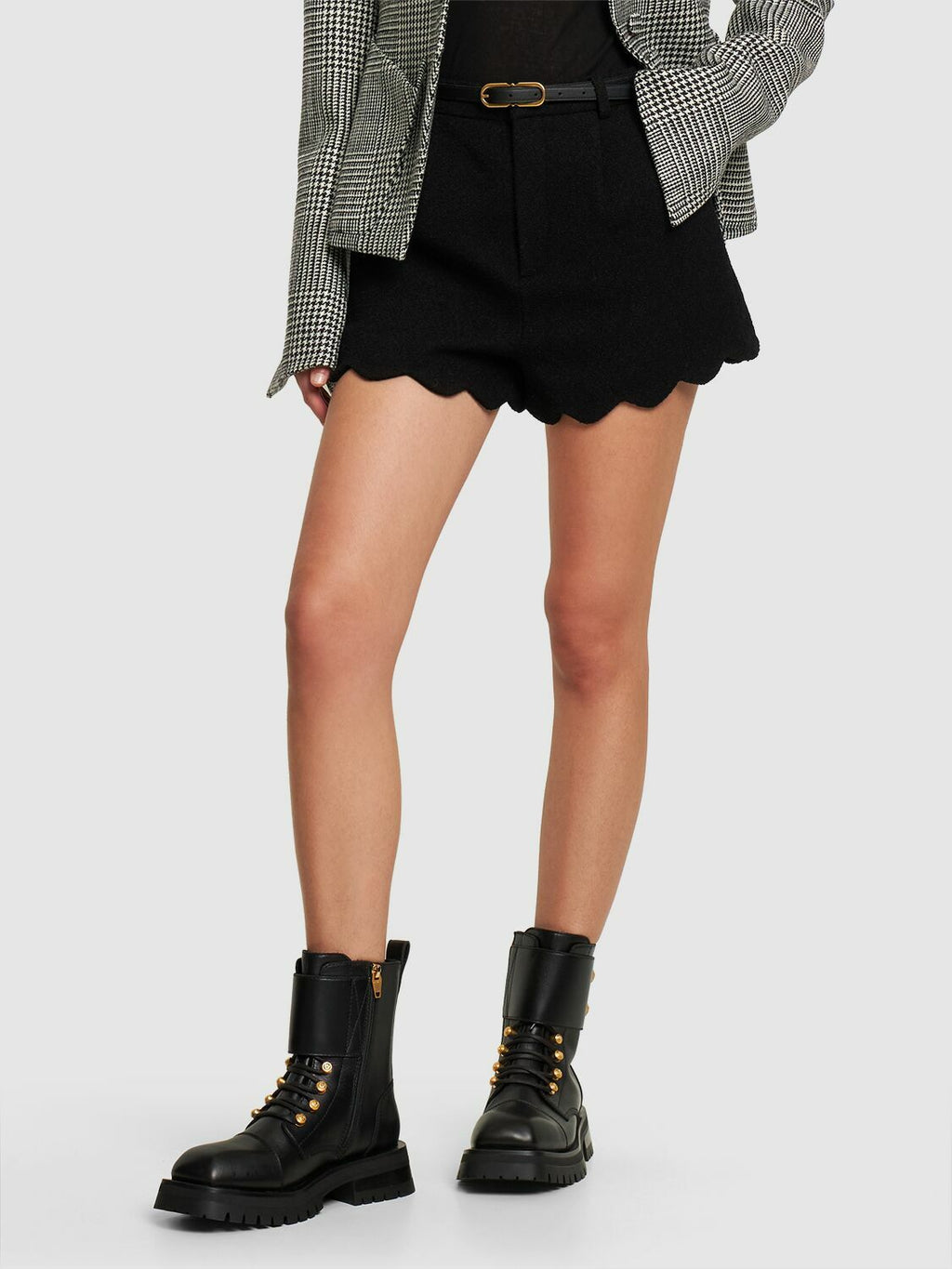Women's Balmain military button leather combat boots with sturdy soles and decorative gold buttons, stylish and durable footwear.