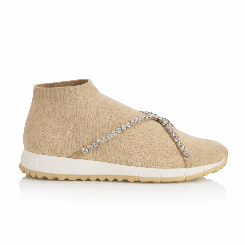 Beige women’s slip-on knit sneaker by Jimmy Choo with crystal-embellished straps and stylish design.