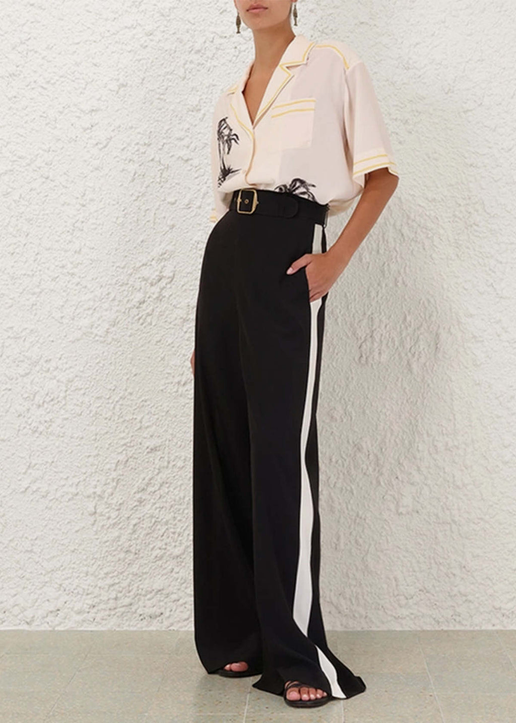 Black Zimmermann women’s track pants with relaxed fit and elastic waistband, perfect for casual and athletic wear.