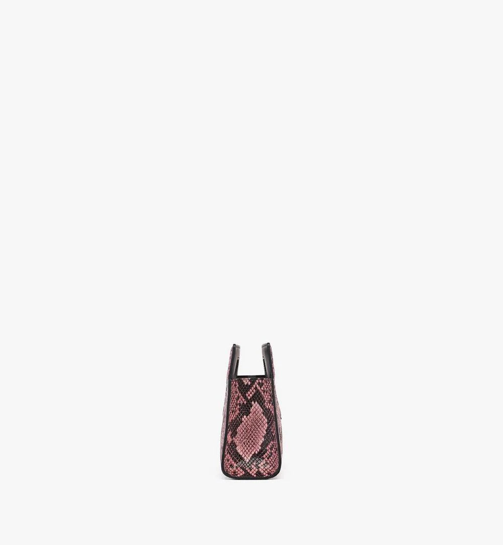 MCM Small Diamond Tote bag in snake-embossed leather with diamond pattern, stylish women's fashion accessory.