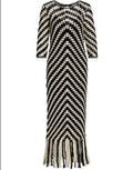 Zimmermann Halliday hand-crocheted midi dress displayed on a hanger with intricate crochet details and a flowing silhouette.