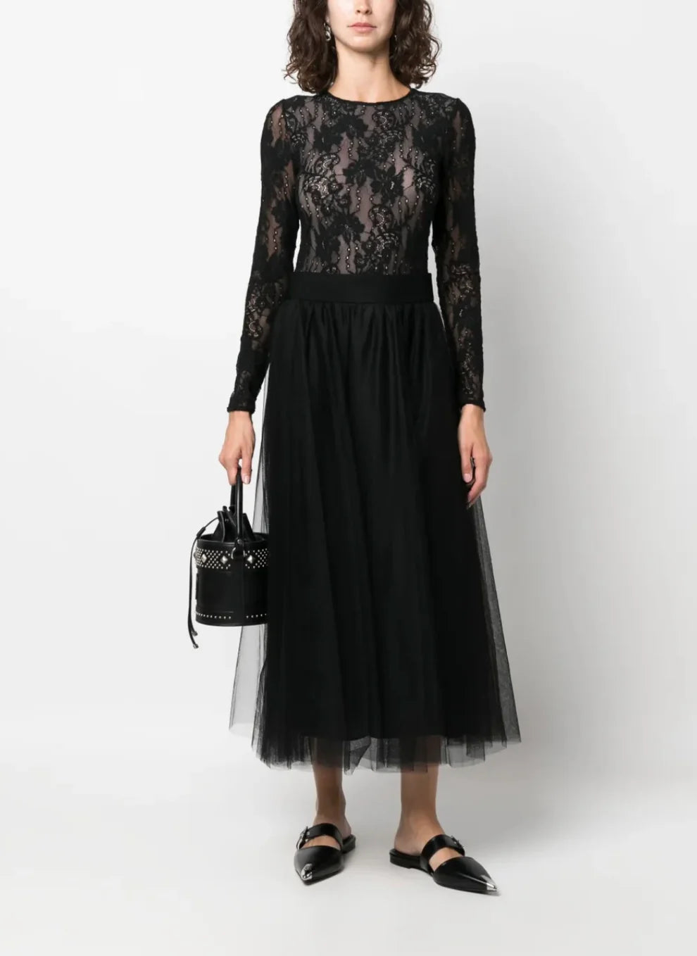 Black high waist tulle skirt for women by Zimmermann, flowing and elegant, showcased on a model.