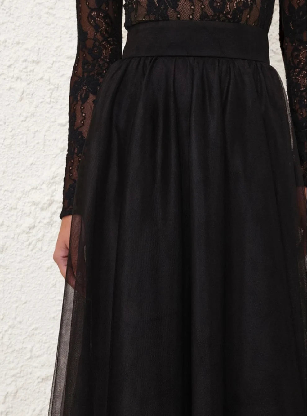 Black high waist tulle skirt for women, stylish and elegant Zimmermann fashion, shown on model with flowing fabric.