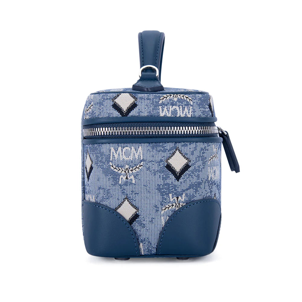 MCM X-Mini Rockstar vanity case in vintage jacquard monogram fabric, compact women’s bag with gold-tone hardware and structured design.