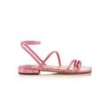 Jimmy Choo Leo flat sandals with metallic pink leather finish, showcasing stylish open-toe design and slim ankle straps.
