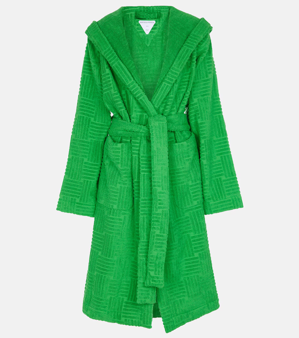 Bottega Veneta Intrecciato cotton-terry hooded robe displayed on a hanger, showcasing luxurious fabric and sophisticated design.