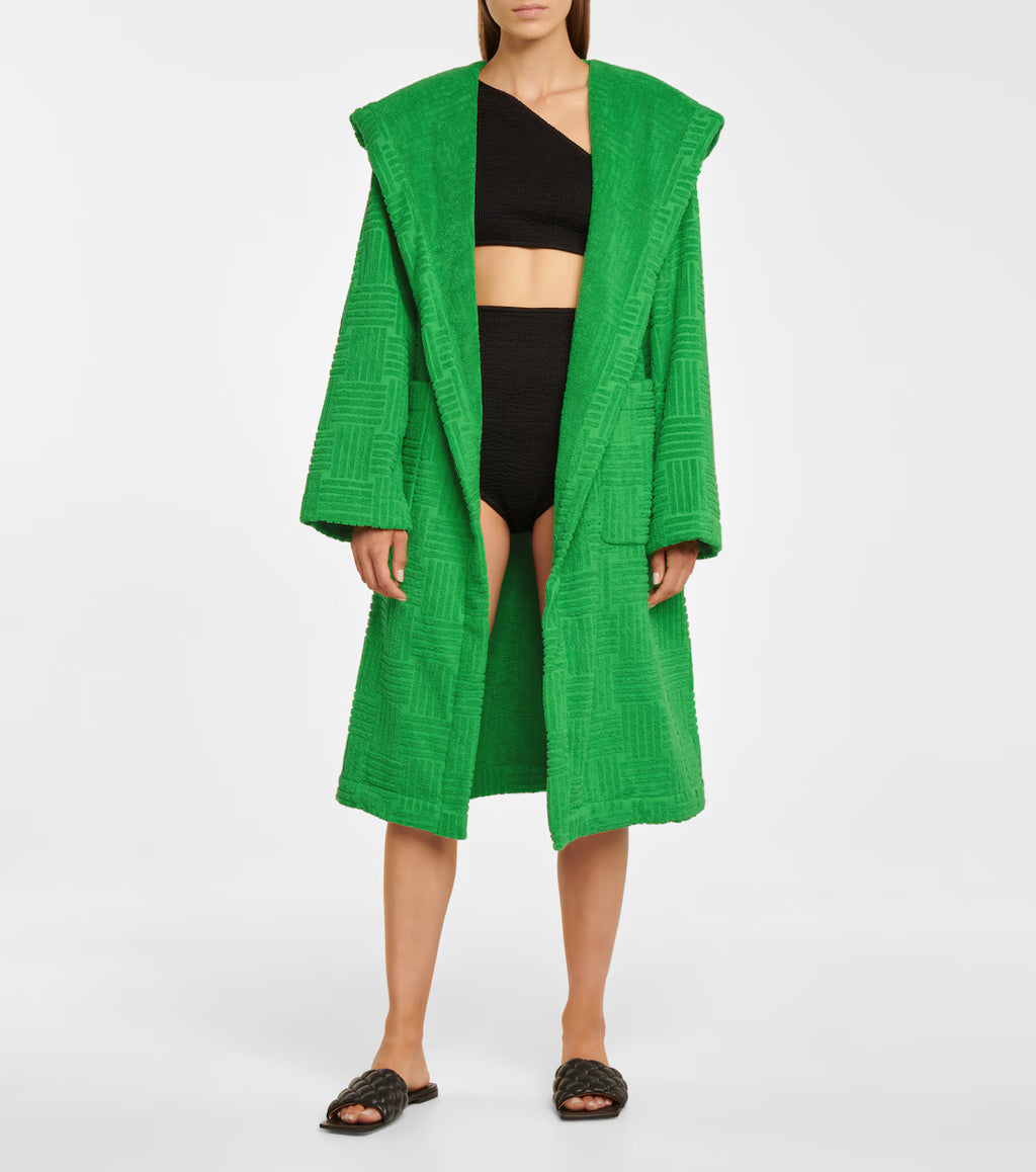 Bottega Veneta Intrecciato cotton-terry hooded robe shown in a luxurious, soft fabric with a stylish hood and intricate woven details.