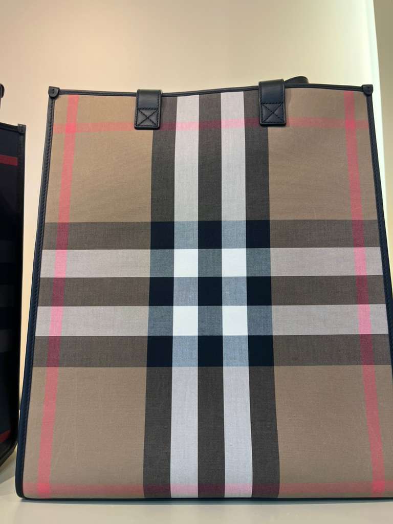 Burberry Book Tote Bag for women featuring the iconic check pattern and spacious design, ideal for stylish everyday use.