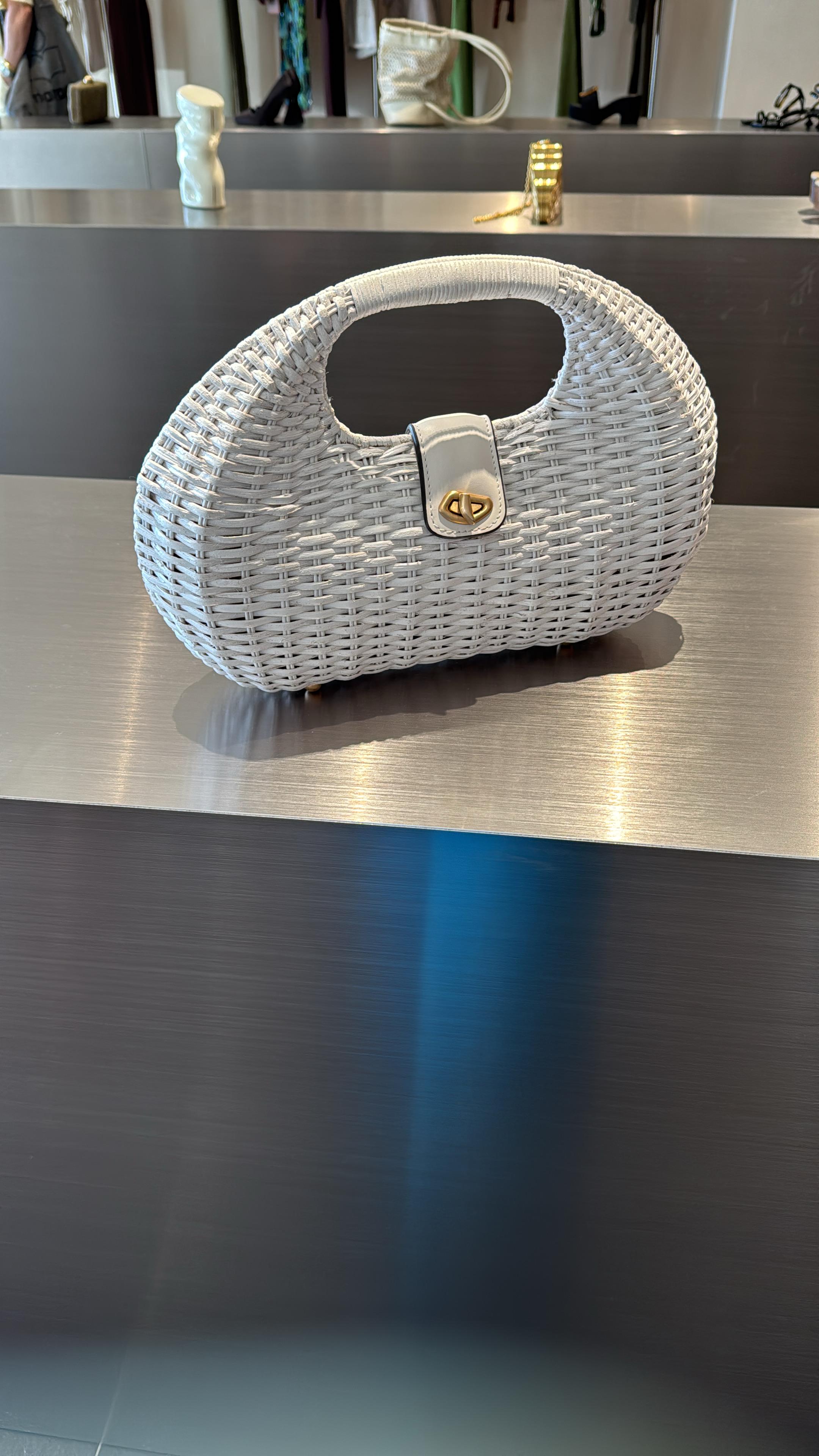 Woven tote bag from Cult Gaia Lydia collection, stylish women’s bag with natural woven design and sturdy handles.
