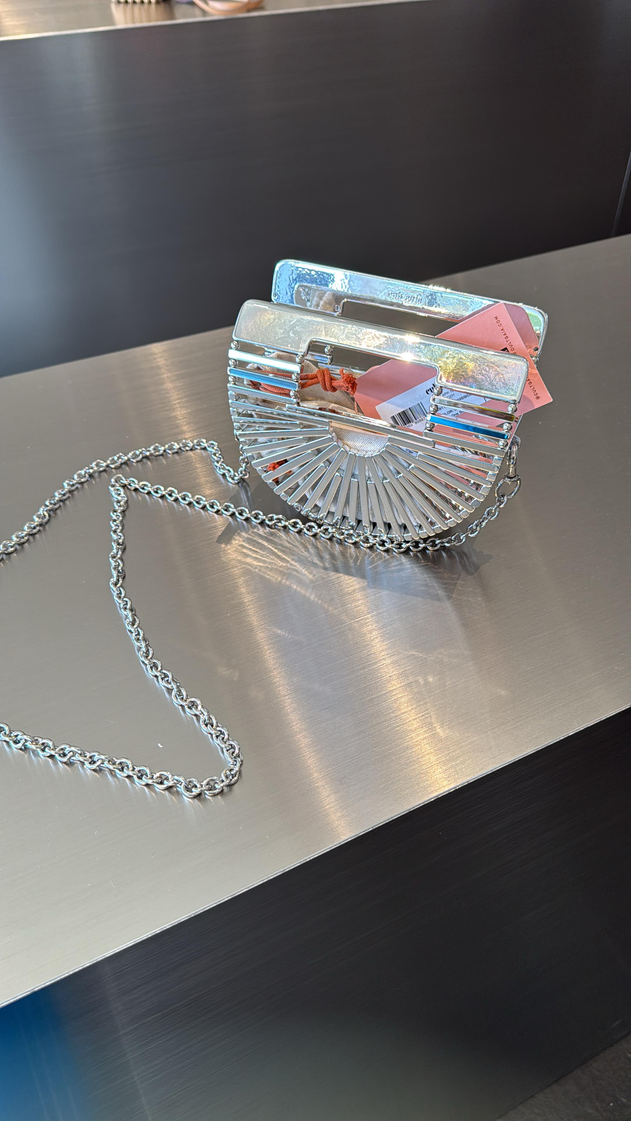 Silver metallic Cult Gaia Nano Ark crossbody bag for women, featuring a sleek, modern design and compact size.