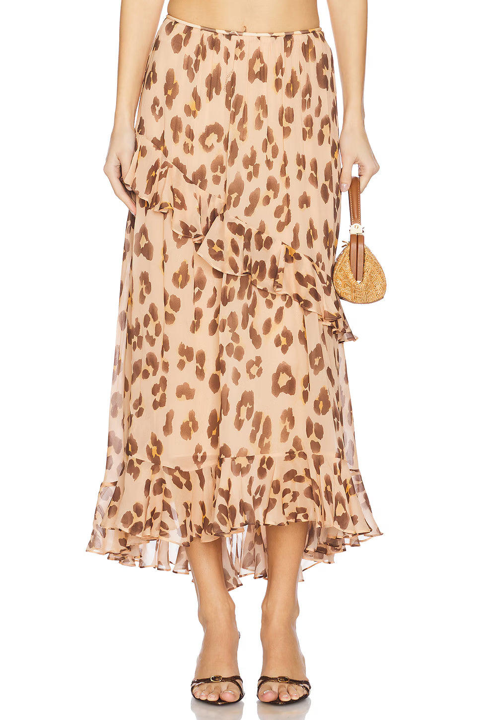 Zimmermann Illuminate Asymmetric Skirt for women, showcasing its stylish design and flowing fabric in a natural pose.