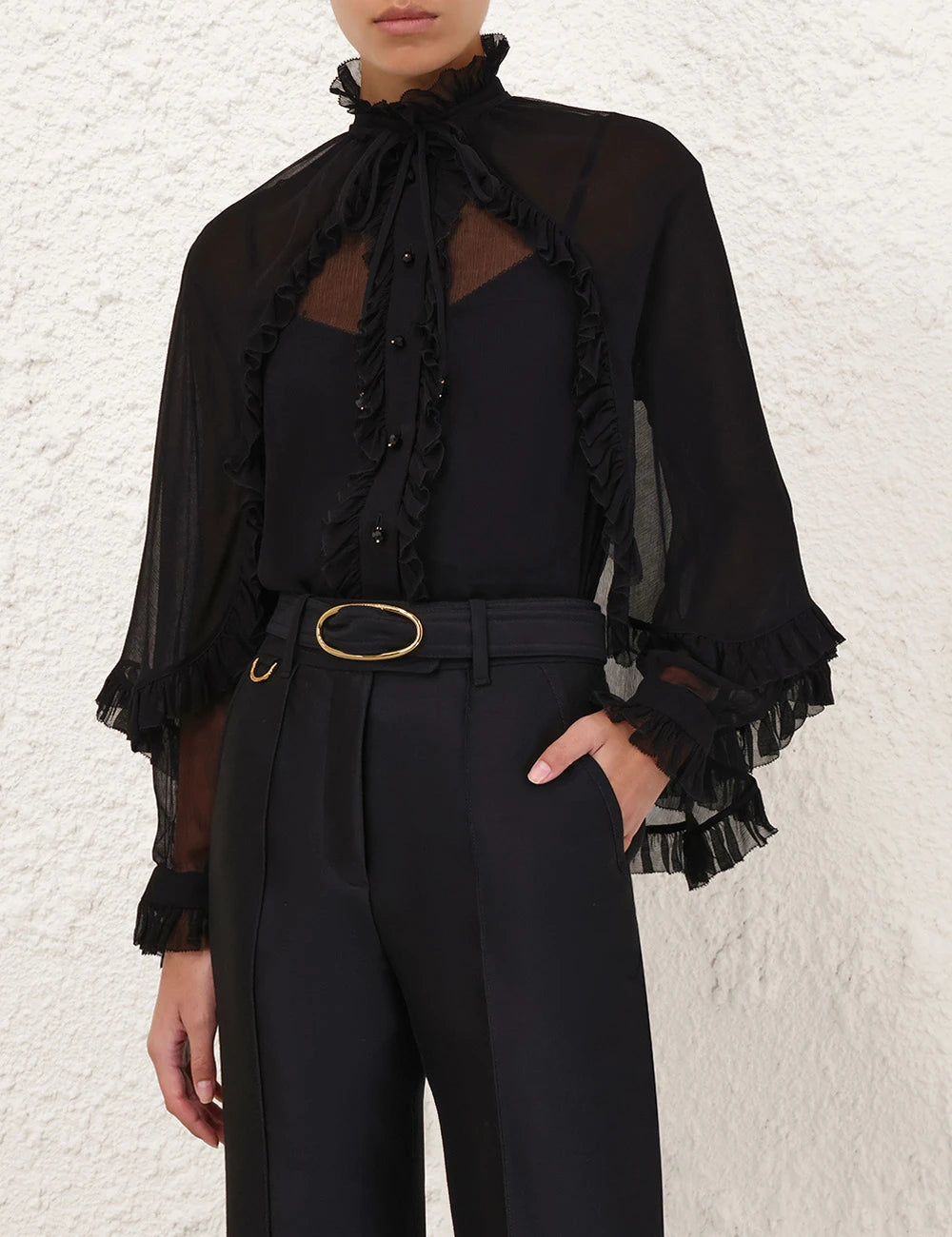 Zimmermann Illuminate Cape Shirt for women, featuring a flowy cape design and elegant fabric in a stylish apparel style.