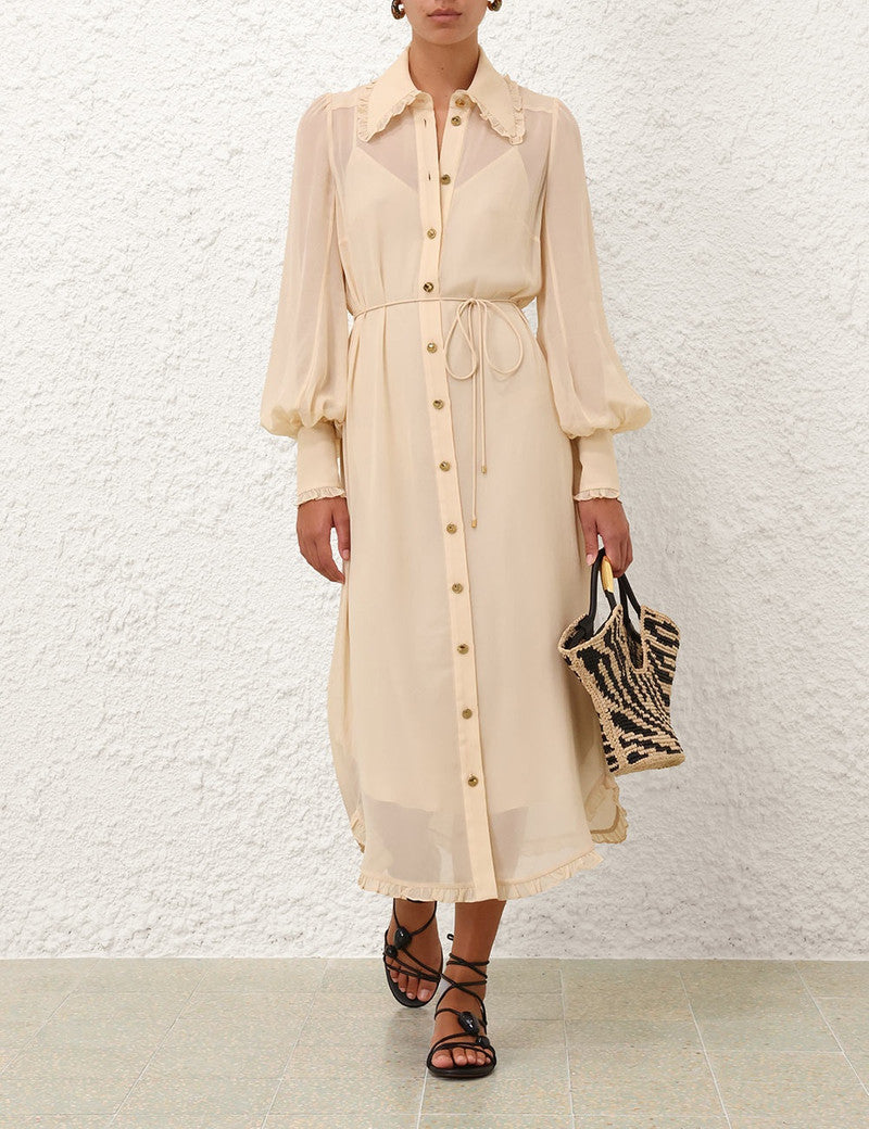 Zimmermann Ruffle Midi Dress for women, featuring feminine ruffles and a flowing silhouette, displayed on a hanger.