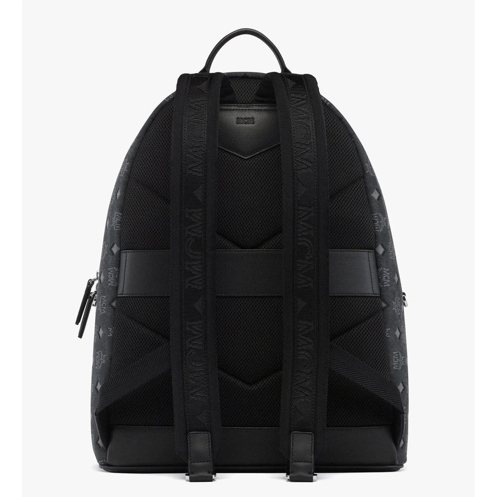 MCM Stark Backpack in Denim Visetos XL, women's designer bag with oversized denim and signature pattern, stylish and spacious.