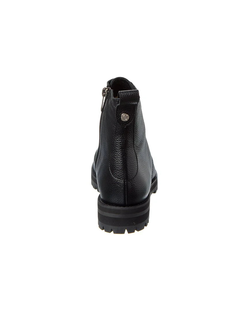 Jimmy Choo Halden black pebbled-leather women’s combat boots with rugged sole and lace-up design.