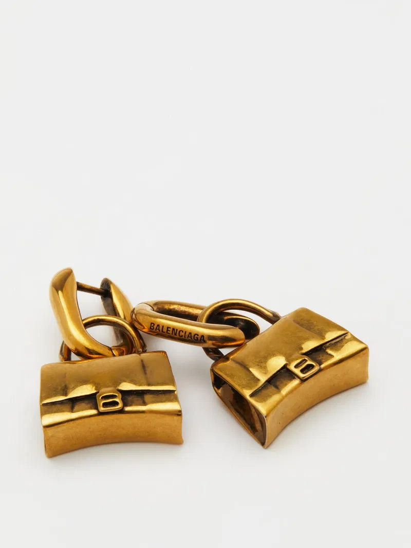 Balenciaga Hourglass Bag Stud Earrings, stylish accessories featuring gold-tone design and unique hourglass shape.