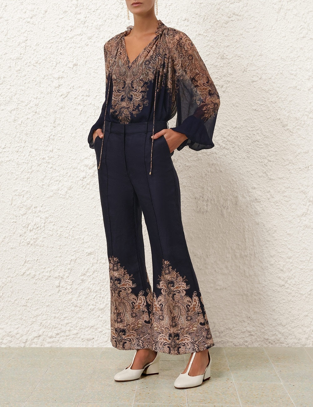 Zimmermann Natura Flare Pant for women, stylish high-waisted pants with a flared leg design, in natural fabric.