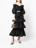 Zimmermann women’s pleated off-the-shoulder top and ruffle skirt set, stylish and elegant apparel with flowing fabrics and feminine details.