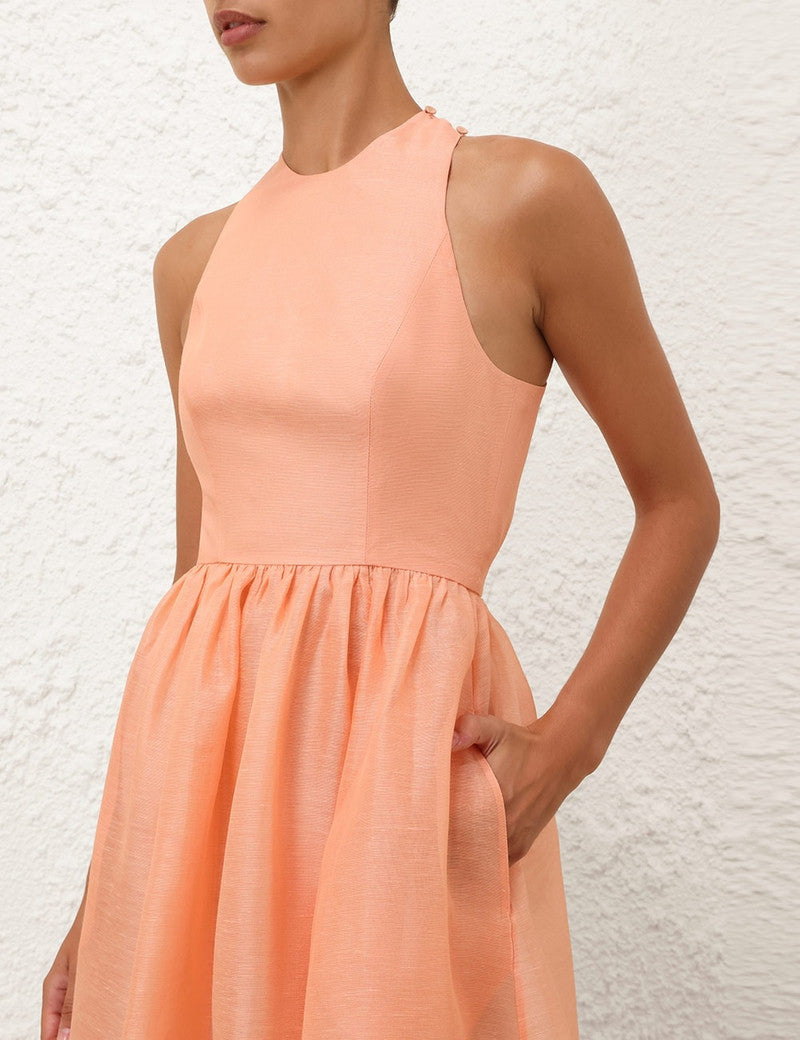 Zimmermann Illuminate Racer Maxi Dress for women, flowing fabric, sleeveless design, and elegant style in a vibrant color.