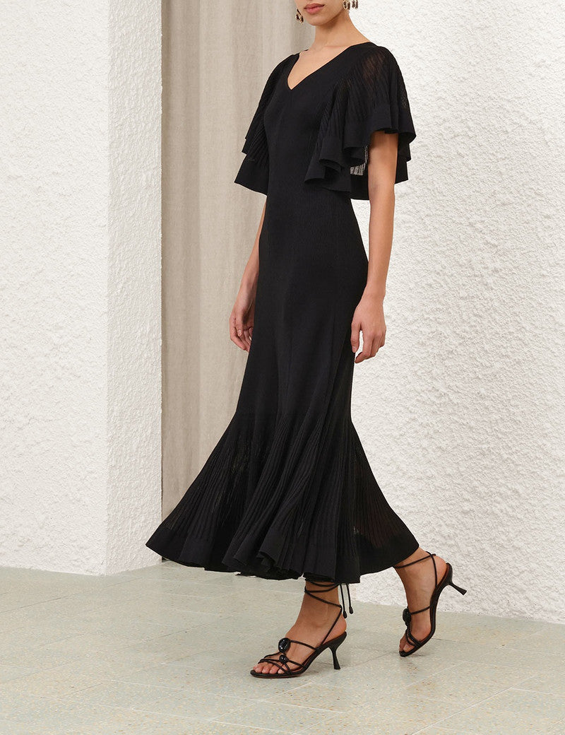 Zimmermann Illuminate Pleated Frill Maxi Dress for women, featuring flowing fabric and elegant pleats in a vibrant design.