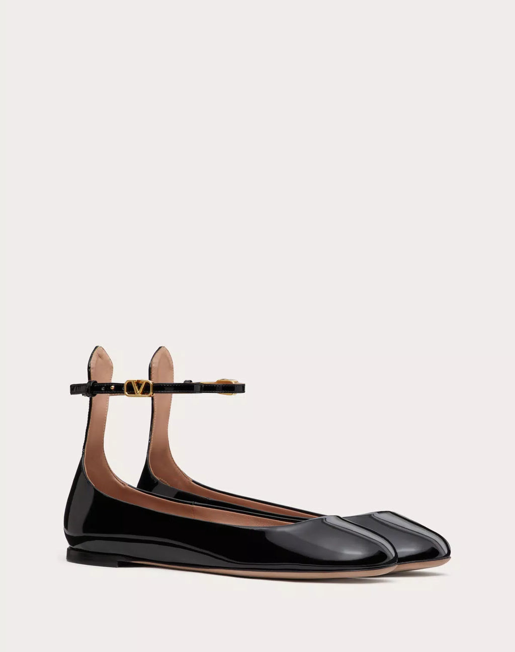 Valentino Garavani Tan-go patent leather ballerina shoes for women, featuring sleek, shiny finish and classic slip-on style.