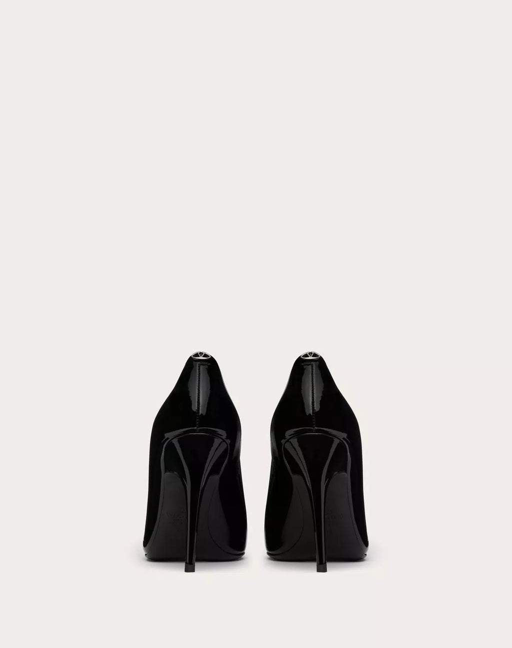 Valentino Garavani Le Salon 105mm patent leather pumps for women, elegant high heels with sleek shiny finish.