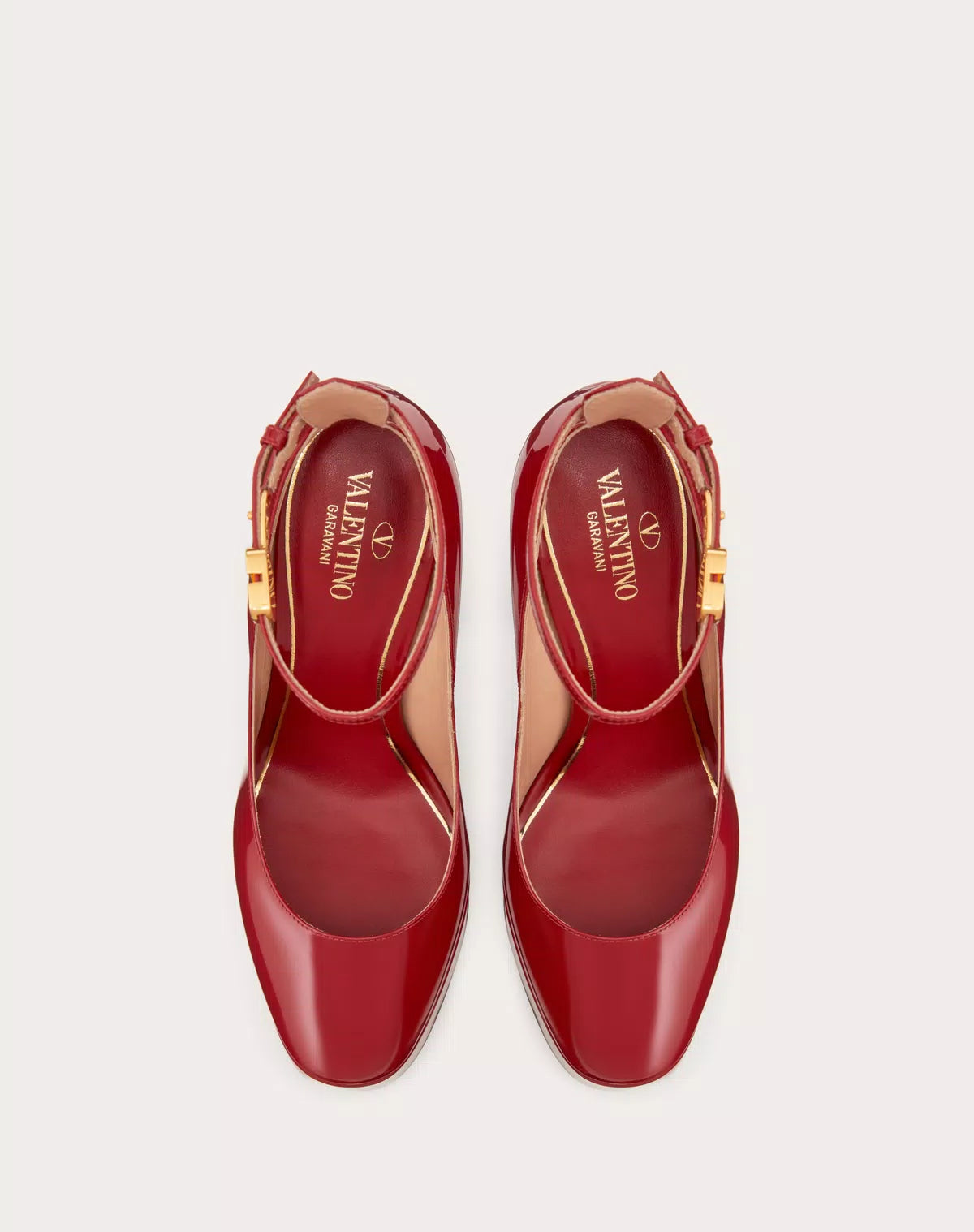 Valentino Garavani Tan-go platform pump in shiny patent leather with 155mm heel, women's stylish high heel footwear.